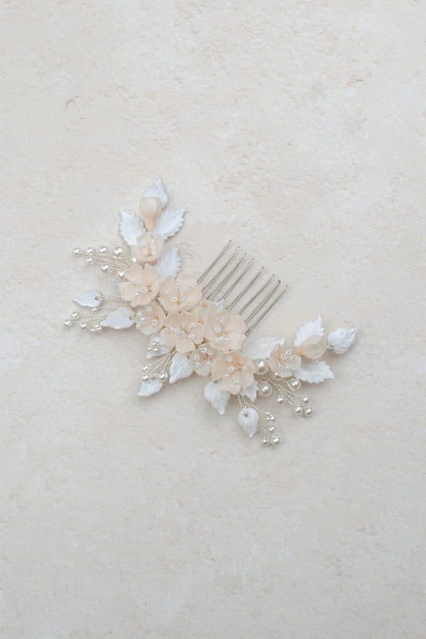 white floral bridal hair comb pearls and white leaves wedding hairpiece