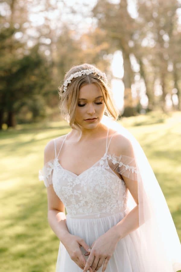 White clay flower bridal headband with pearl accents luxury wedding hair accessories