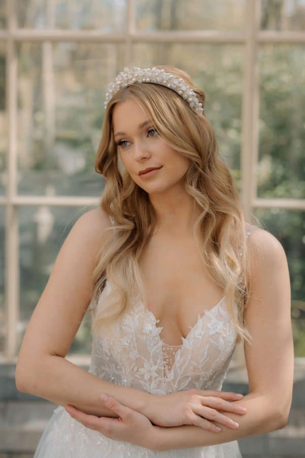 Soft nude beige bridal headband featuring crystal leaves and pearl accents wedding hair accessories