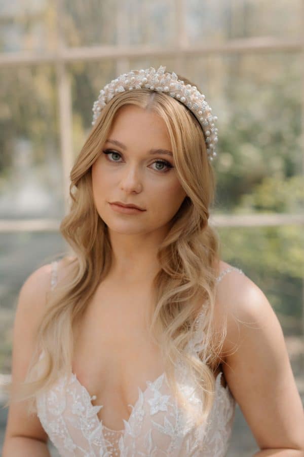 Soft nude beige bridal headband featuring crystal leaves and pearl accents luxury wedding hair accessories