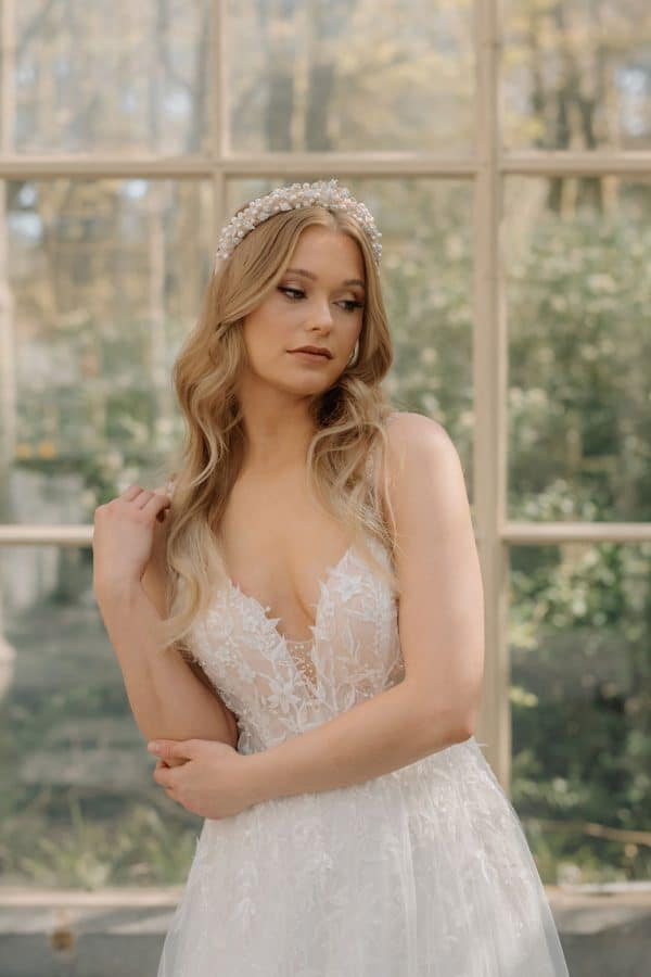 Soft nude beige bridal headband featuring crystal leaves and pearl accents wedding hair accessories