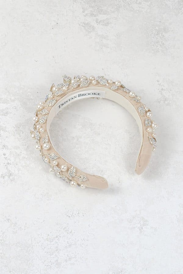 Soft nude beige bridal headband featuring crystal leaves and pearl accents wedding hair accessories